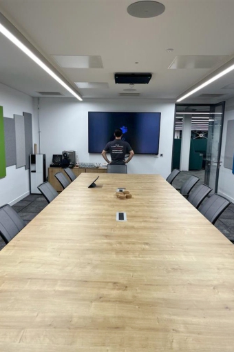 Installing audiovisual equipment in a large meeting room at Bristol airport