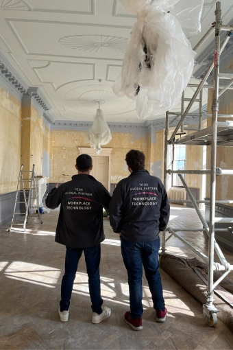 Julian and Marcelo viewing the ball room in preparation for a large audiovisual install.