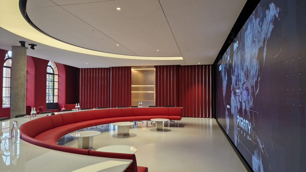 Expansive multi-purpose presentation and event suite with 9m LED display.