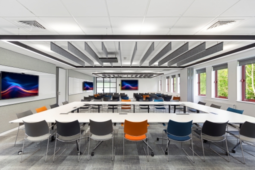 Large event space multi-purpose room Large event space and multi-purpose divisible room with repeater screens.