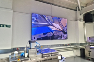 LED screen showing packing lines at Multivac Innovation Centre